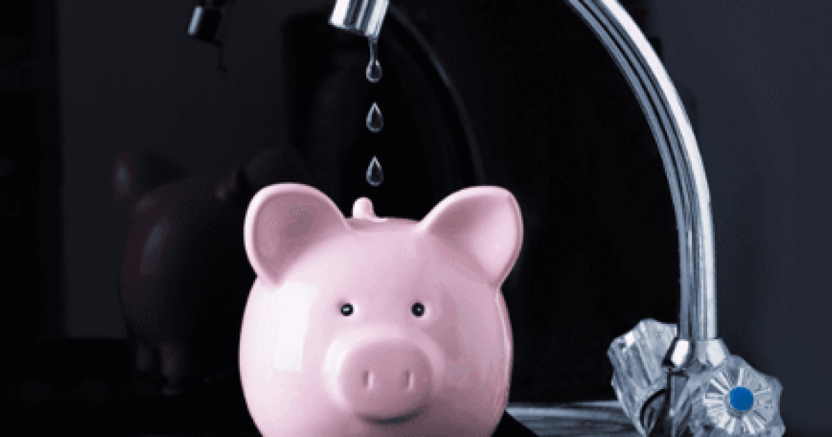 faucet dripping into a piggy bank